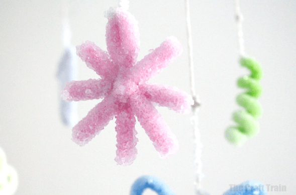 christmas crafts for kids shows crystalized start ornaments.