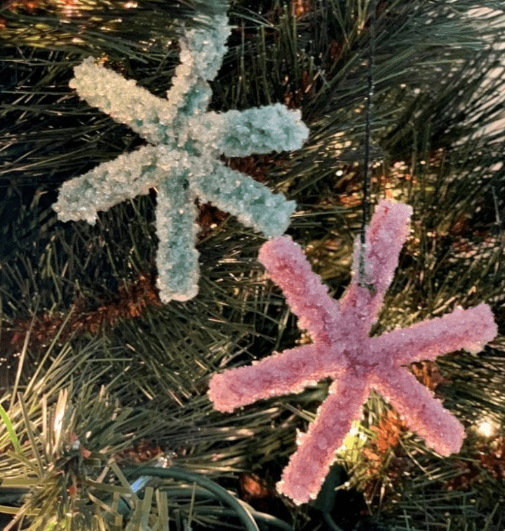 Christmas STEM activities shows two star ornaments.