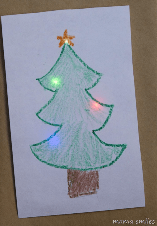 Christmas STEM shows a hand drawn Christmas tree with some lights behind.