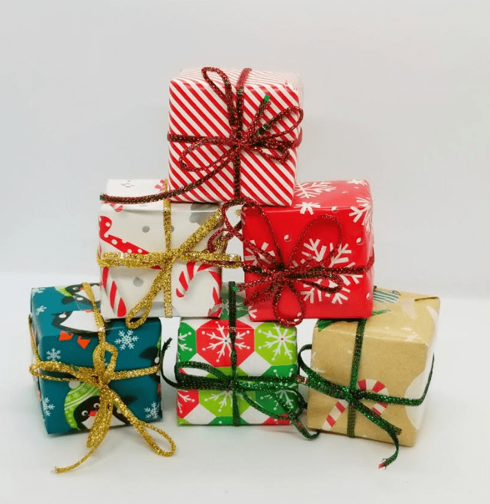 DIY Christmas Escape Room shows a pyramid of six mini gifts.