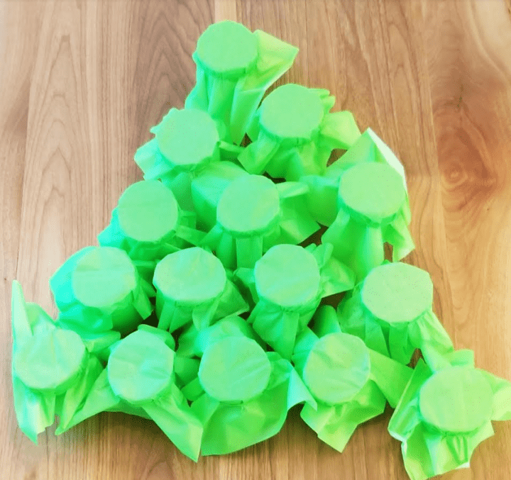 Christmas activities for kids shows a tissue paper tree.