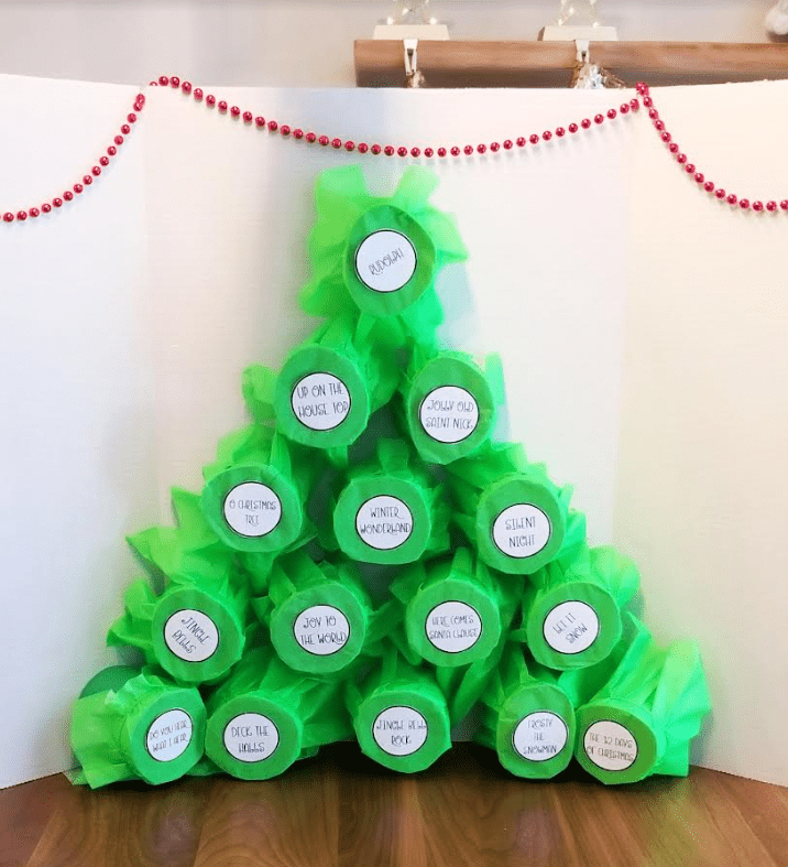 DIY Christmas Escape Room shows a tree made from cylinders and tissue paper.