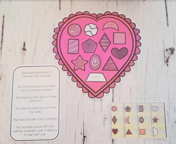 valentines escape room printables shows a printed box of chocolates and two other printed pages.