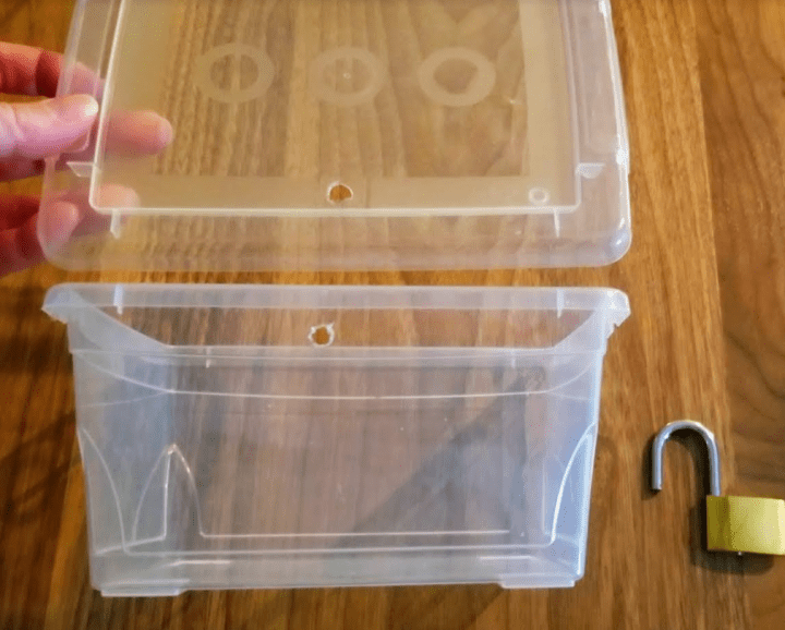 how to make an escape room lock box ideas shows a plastic container with a hold put into the top and bottom.