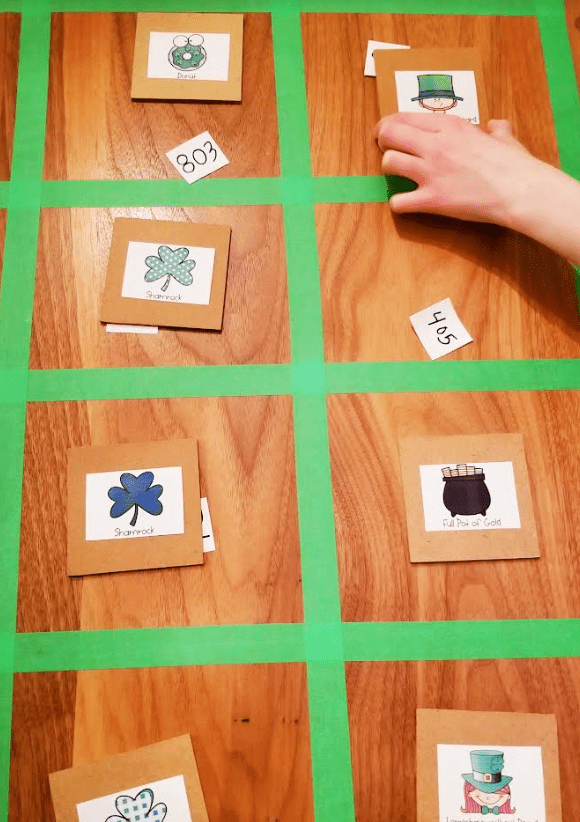 escape room ideas shows a child placing pictures in a grid.