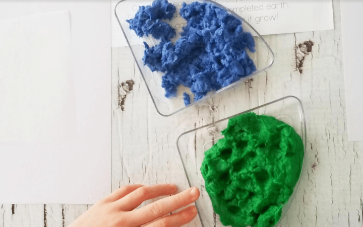 Recycled crafts for kids shows two container with paper pulp in each.