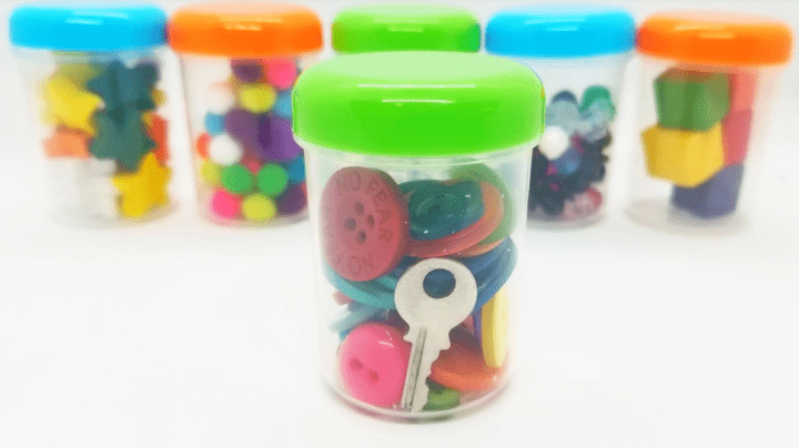 stem escape room shows jars with colorful objects and keys in them.