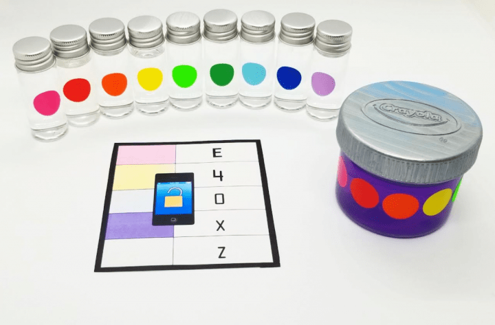 stem escape room shows nine small clear jars a printable and a jar with purple liquid.