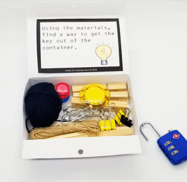 stem escape room shows a stem building challenge box with various materials to build with in it.