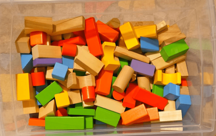 10 exciting STEM Activities shows a bin of colorful wooden blocks.
