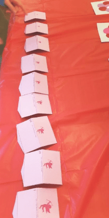 valentines day escape room shows a row of cards with cupids on them.