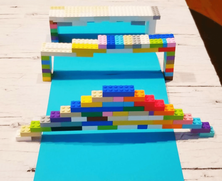 stem challenge shows three bridges made from Lego. 