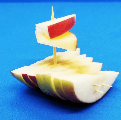 STEM activities shows an apple boat.