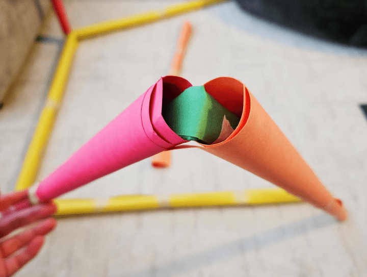 easy stem challenge shows two construction paper rolls.