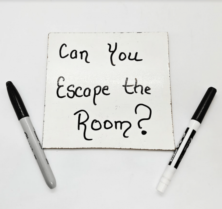 build your own escape room shows a write and wipe board that says can you escape the room.