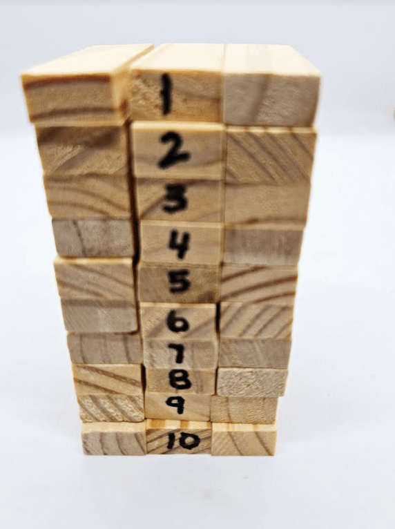 build an escape room at home shows a stack of blocks with number 1-10 down the middle blocks.