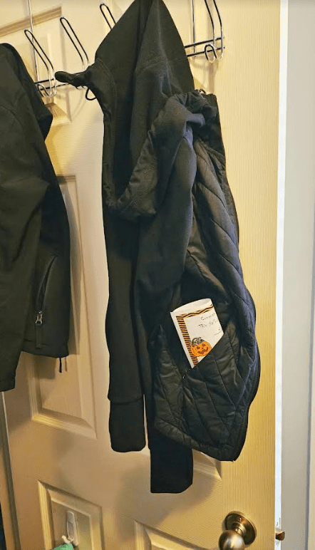 halloween for kids shows a jacket hanging in a closet.