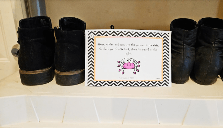 free printable halloween scavenger hunt  shows a printed clue set by shoes.