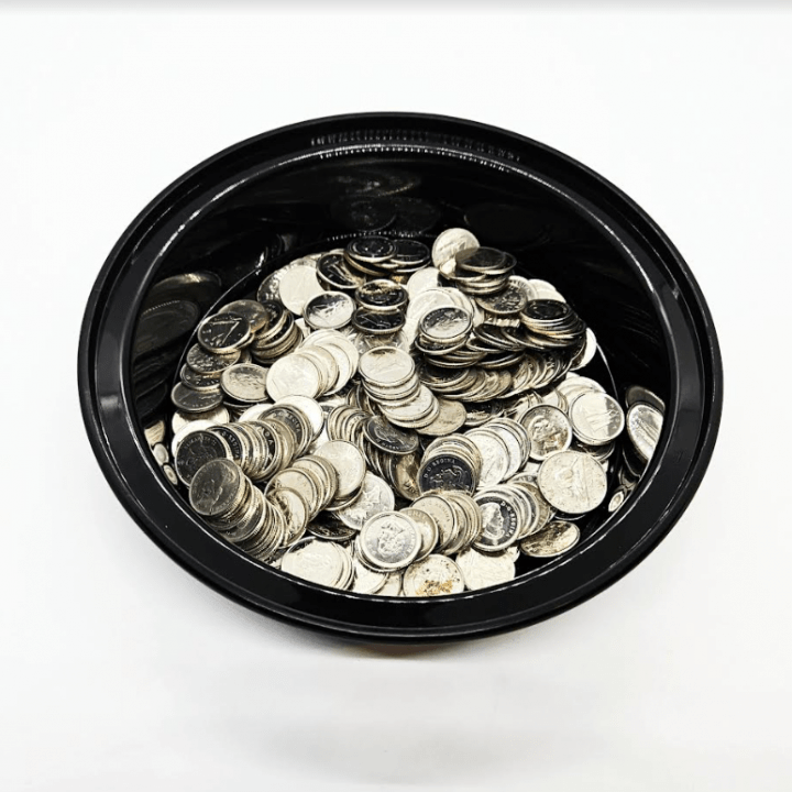 DIY escape room puzzles shows a bowl full of dimes.