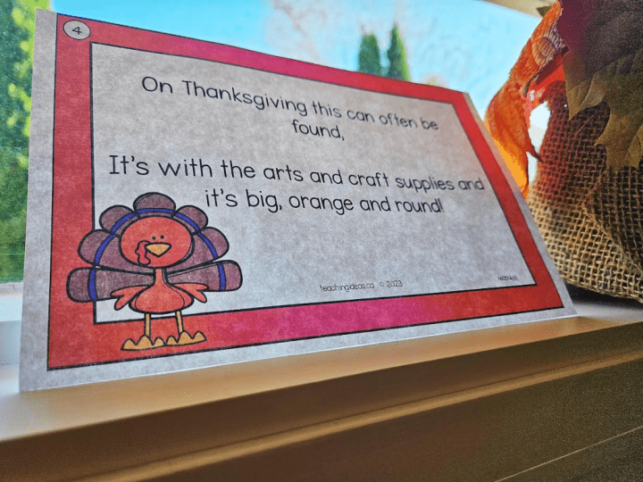 free thanksgiving classroom scavenger hunt shows a clue in a window frame.