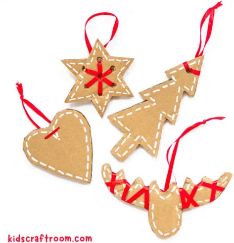 preschool christmas craft shows four cardboard ornaments.
