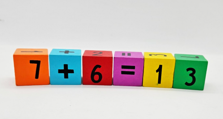 escape room ideas shows six blocks with numbers and addition and equal sign.