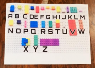 puzzles for kids shows an alphabet board made from lego.