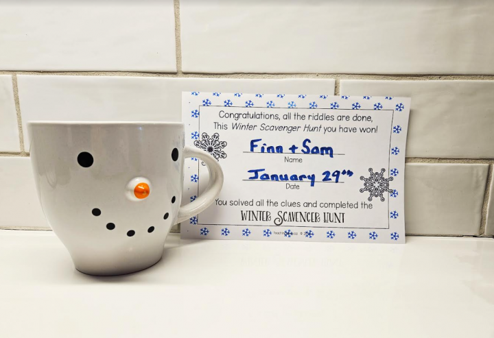 treasure hunt game shows a snowman mug and completion certificate.