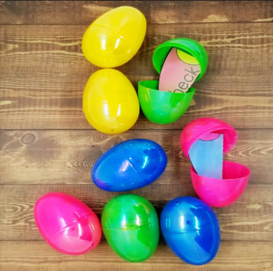 easter escape room shows plastic eggs with puzzle pieces inside.