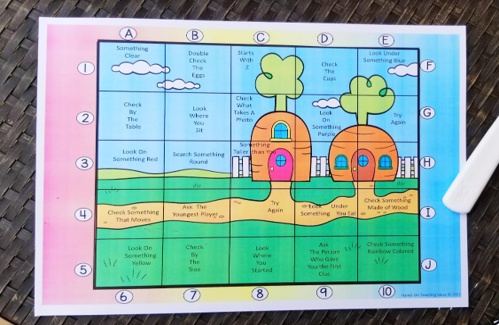 spring escape room shows a printed puzzle for spring with an image of carrot houses and words in each square the page is divided into.