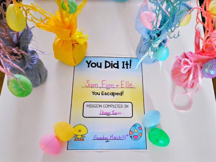 spring escape room shows the certificate surrounded by Easter decorations.