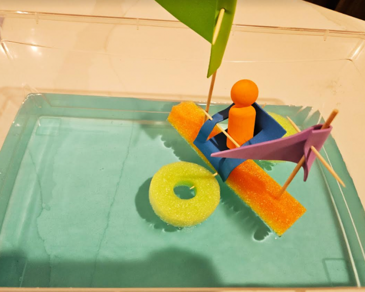 stem building challenge shows a boat in water.