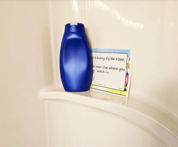 game for kids shows a shampoo bottle and a riddle on a page beside it.