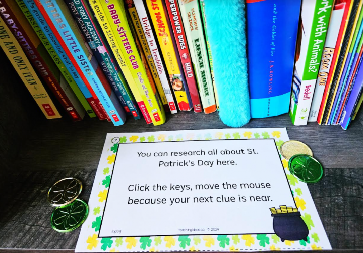 treasure hunt for kids shows a printed clue with plastic shamrock coins around it.