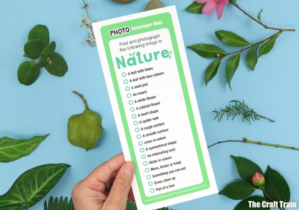 nature photo activity shows a person holding a nature checklist with leaves around it.