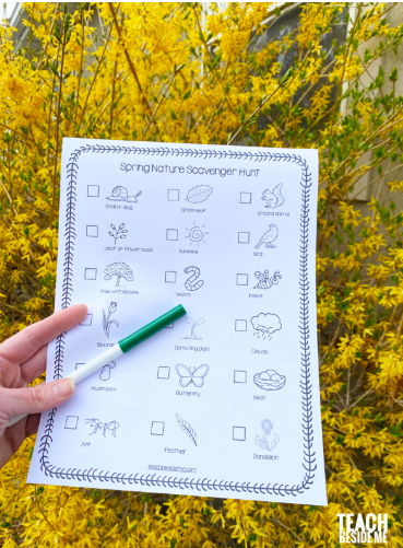 spring nature scavenger hunt shows a person holding a checklist of spring things to find in nature.