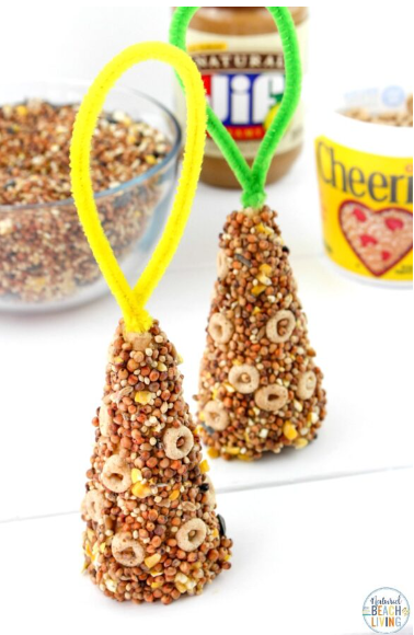 bird feeder shows two feeders made from peanut butter and cereal.