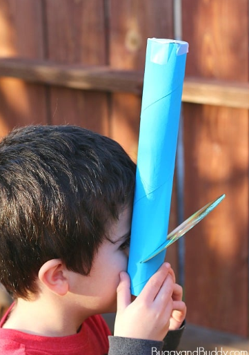 Summer Outdoor Learning Activities shows a child looking through a spectroscope.