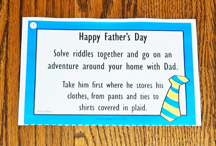 Free Fathers Day Scavenger Hunt shows a riddle sitting on a hardwood floor.