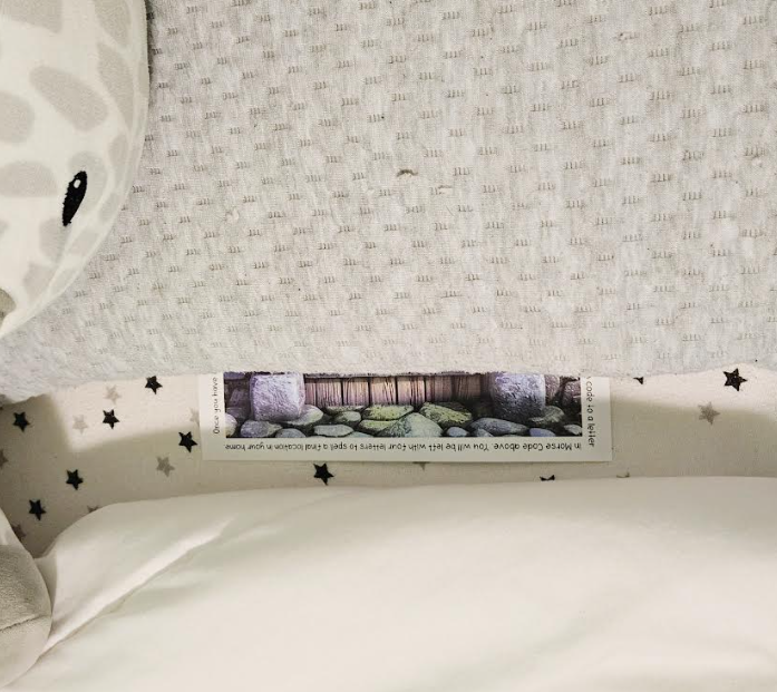 free printable escape room for kids shows a puzzle under a pillow.