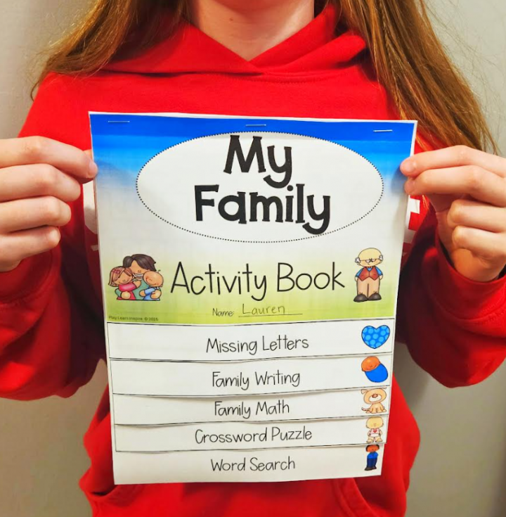 my family printable flipbook shows a child holding a flipbook printable with flaps.