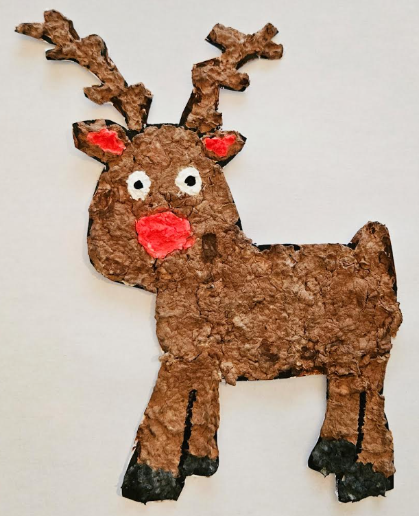 Chrismtas craft for kids shows a reindeer made from paper mache.