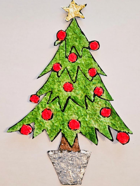 recycled paper mache Christmas tree craft shows a tree image filled with colored paper mache.