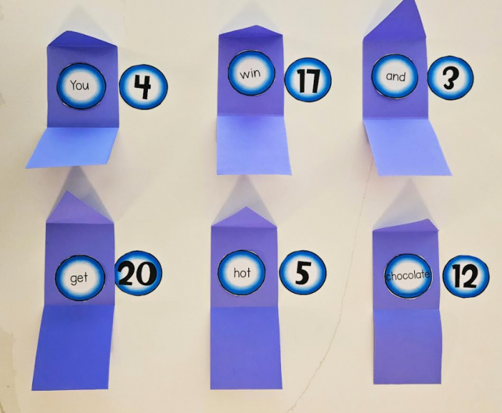 winter escape room shows six envelopes with words in each and number cards beside each.