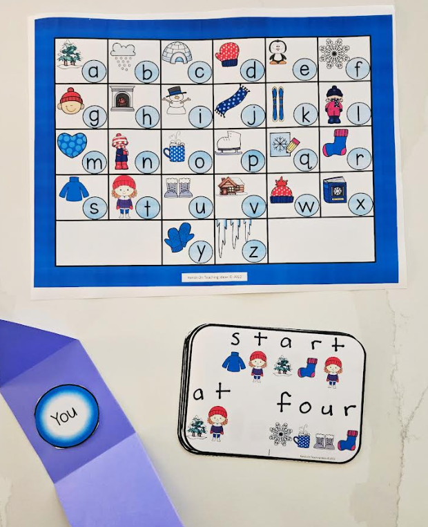 learning game for kids shows an alphabet card with matching letter and images and an answer card.
