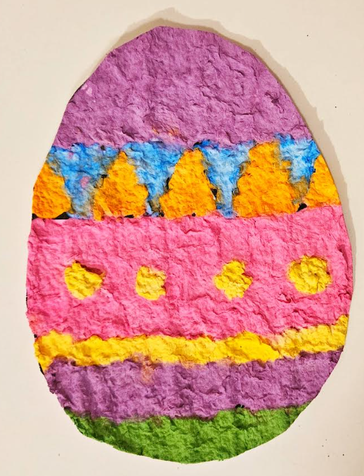 free Easter Paper Mache Project shows a cut out egg made from paper mache.