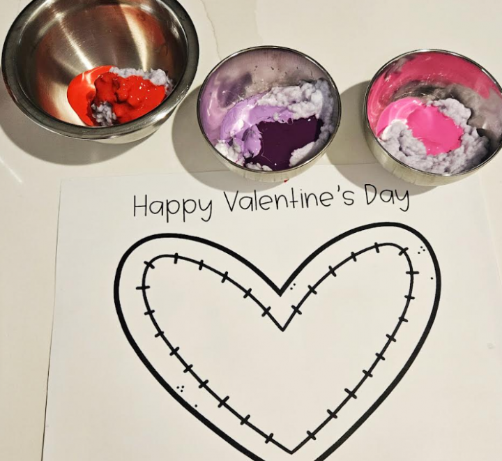 free valentines day paper mache activity shows a heart printable with three containers with colored paper mache paper.