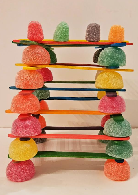 best candy stem challenge shows a tower made from gumdrops and popsicle sticks.