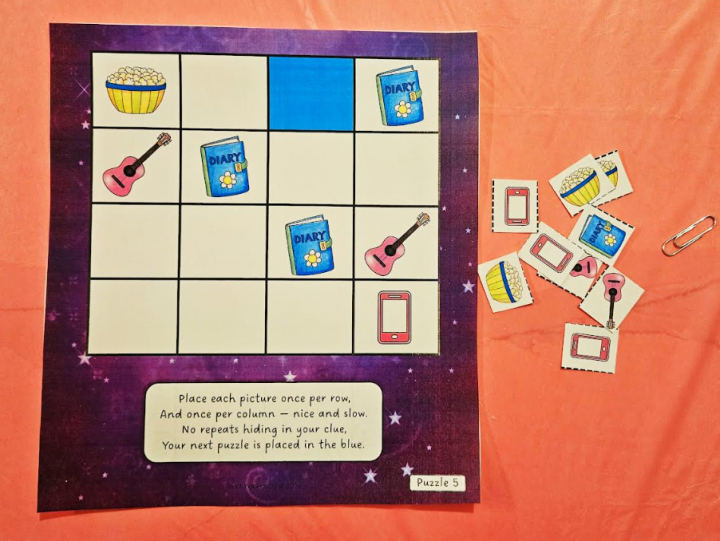 DIY escape room shows a grid with pictures in some squares and cut out of some other images at the side.