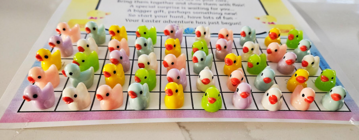 holiday activity for families shows a bunch of colorful plastic mini ducks.